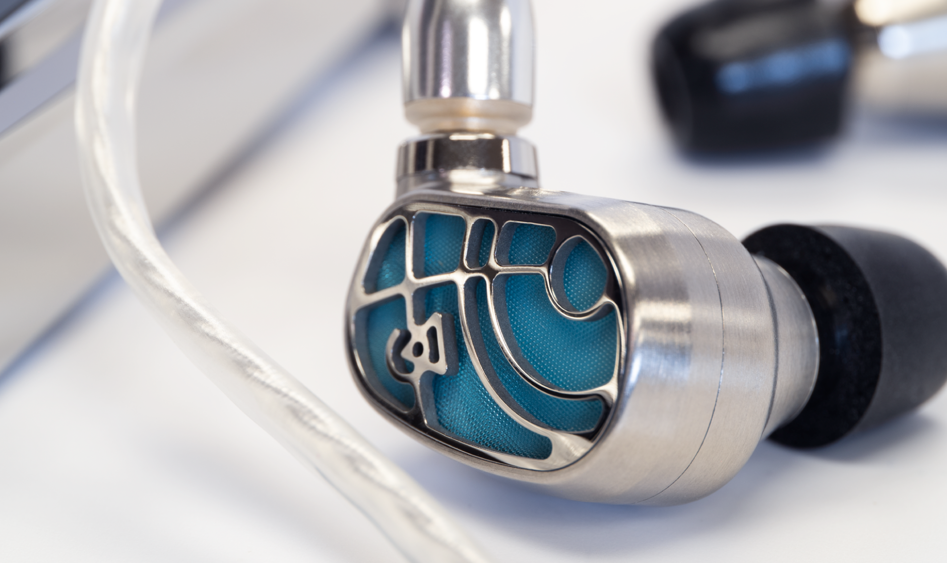 Close up up Campfire Solaris Siren edition on white background with Time Stream cable